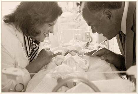 Elder and Sister Rasband with their grandson