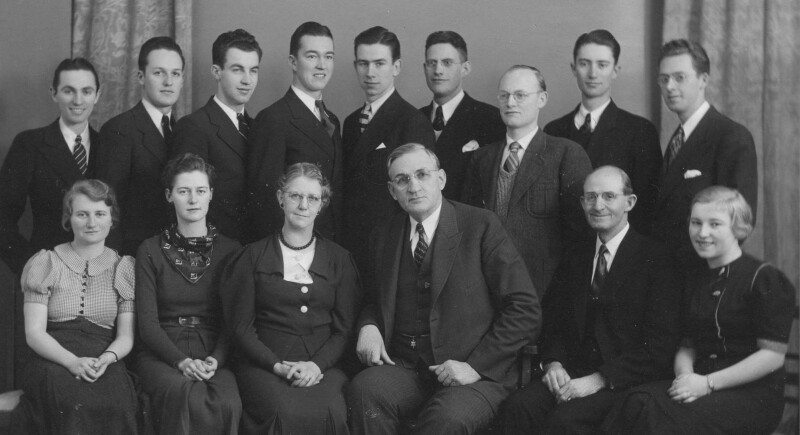 Germany mission president and companion with the office missionaries and staff on May 14, 1937.