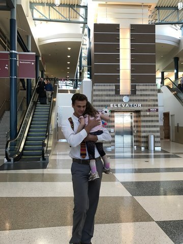 August hugging Eden in the airport