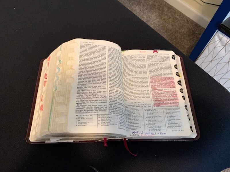 The scriptures that Mark lost on his mission and his brother miraculously found. In these scriptures, Mark's mother had highlighted Moroni 10:3-5 before she gave them to him.