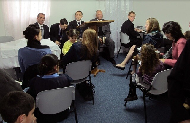 Elder Ronald A. Rasband, then of the Seventy, visiting the Bethlehem Branch.