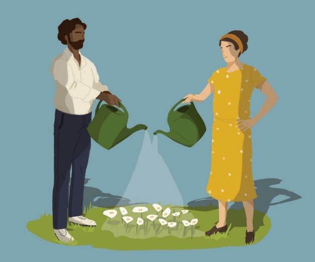 A man and a woman watering flowers.