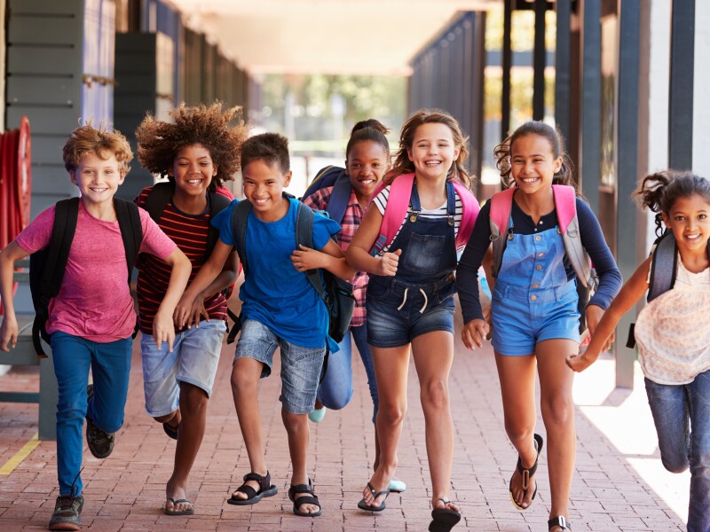 School,Kids,Running,In,Elementary,School,Hallway,,Front,View