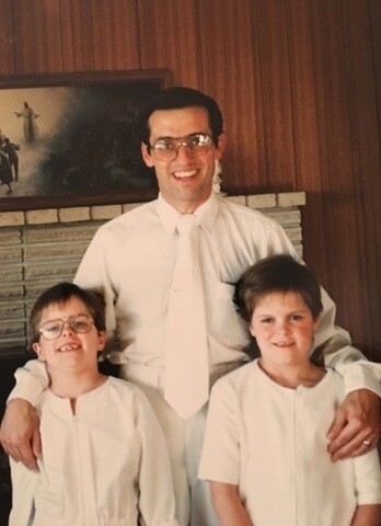 Josh, Jerry, and Jerald on the twins' baptism day one week before Jerald fell from an 80-foot cliff.