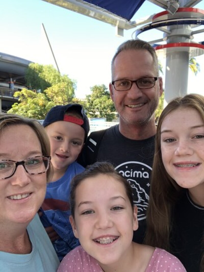 Patricia with her family near the same spot she found her watch in Disneyland. The day after Christmas, Patricia lost her favorite present, a Swatch Watch, and then miraculously found it near this same spot. 