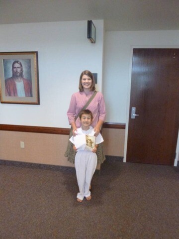 Spencer Evans with his mom Katie Evans on his baptismal day.