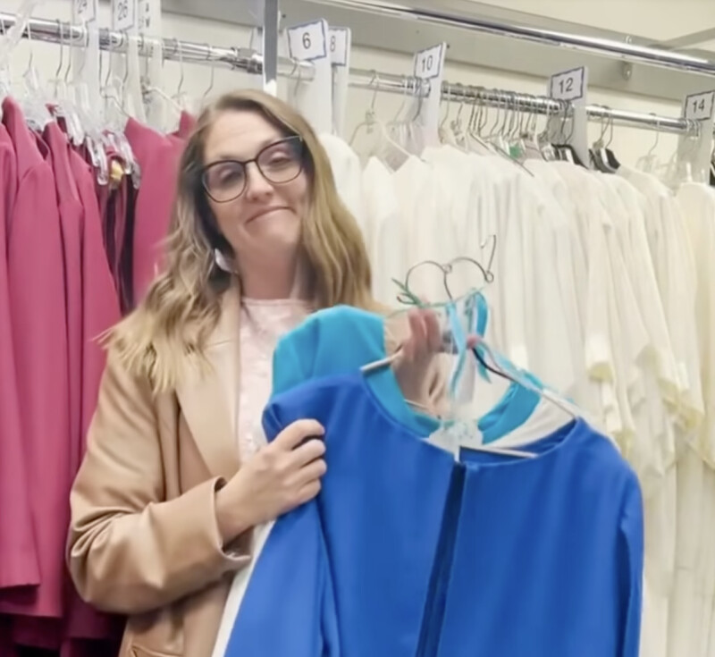 Jenna Barson holds her mother’s dresses that she inherited for The Tabernacle Choir at Temple Square.